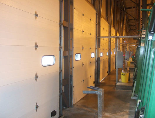 Przemysłowe profesjonalne PCV Szybkie działanie Automatyczne drzwi z zamkiem błyskawicznym 1176pa Odporność na wiatr Wysoka prędkość 1,5 mm Staninless