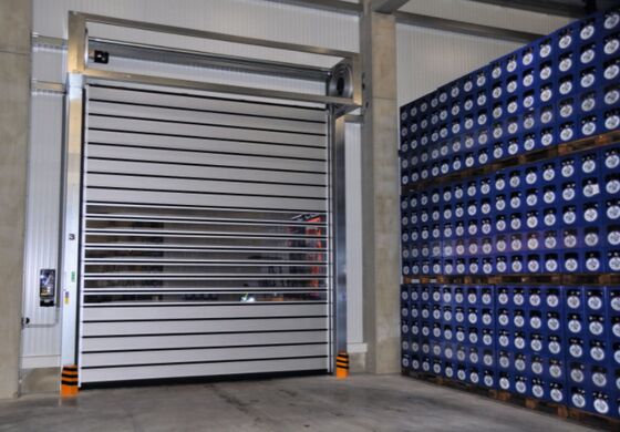 Automatyczne szybkie drzwi spiralne Bezpieczeństwo Wydajność Żywotność 5 milionów cykli Izolowany panel z aluminium elektrycznego do zastosowań przemysłowych